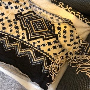 Off the shoulder cropped sweater with fringe